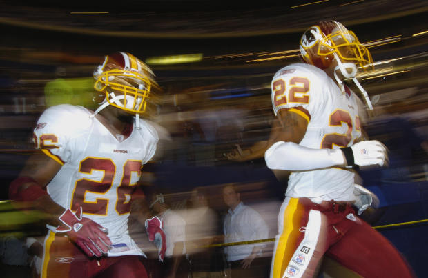 Washington Redskins  running back Clinton Portis (26) and cornerback Carlos Rogers (22) enter Texas Stadium for  a Monday Night Football game September 19