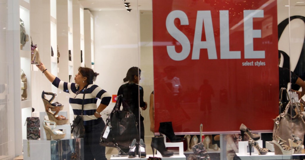 People shop for shoes at Nine West on Black Friday at Dadeland Mall