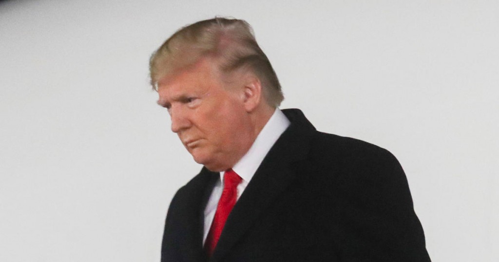 U.S. President Donald Trump disembarks from Air Force One upon arriving at W.K. Kellogg Airport in Battle Creek