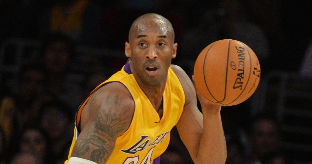 Kobe Bryant of the Los Angeles Lakers drives against the Memphis Grizzlies during their NBA game 33 at the Staples Center in Los Angeles