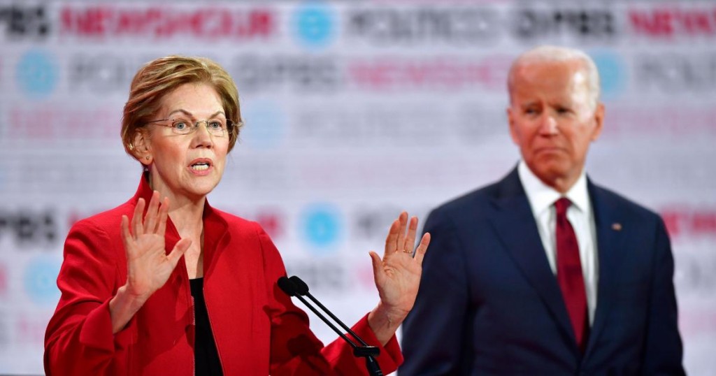 Democratic presidential hopeful Massachusetts Senator Elizabeth Warren (L) speaks as former Vice President Joe Biden looks on during the sixth Democratic primary debate of the 2020 presidential campaign season co-hosted by PBS NewsHour & Politico at Loyola Marymount University in Los Angeles