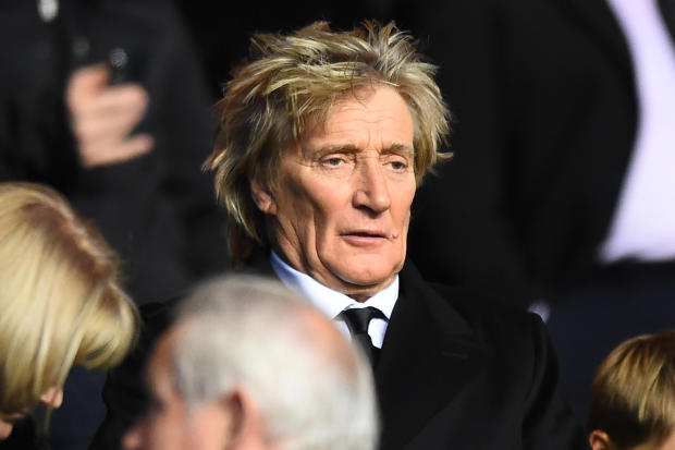 Scottish singer Rod Stewart takes his seat for the UEFA Champions League Group B football match between Celtic and Anderlecht at Celtic Park stadium in Glasgow