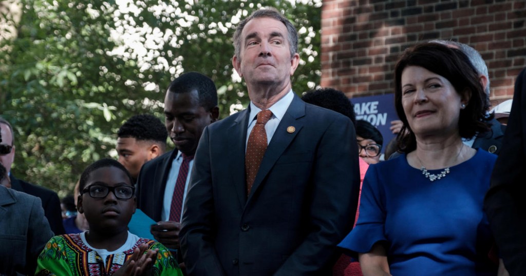 FILE PHOTO: Virgnia Governor Ralph Northam attends a rally held by gun control activists and the families of shooting victims outside the Virginia State Capitol Building in Richmond