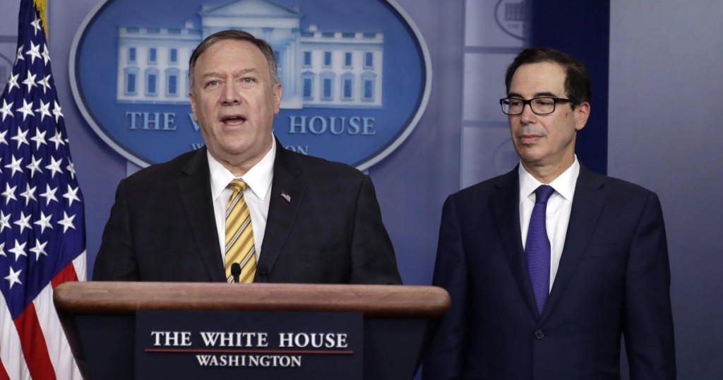 Secretary of State Mike Pompeo speaks as Treasury Secretary Steve Mnuchin listens during a briefing on terrorism financing at the White House