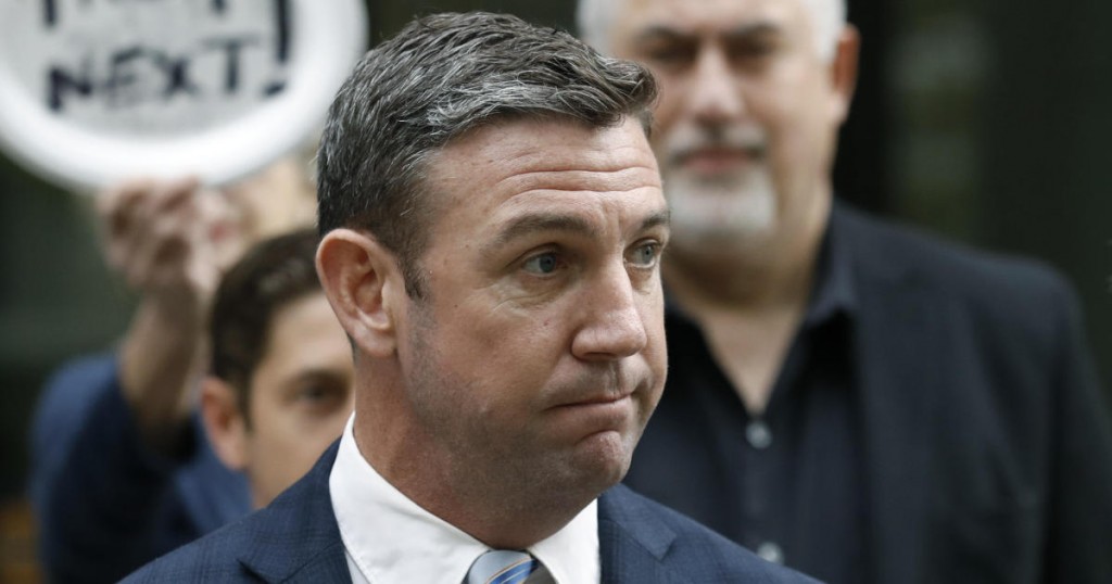 California Republican Rep. Duncan Hunter speaks after leaving federal court Tuesday