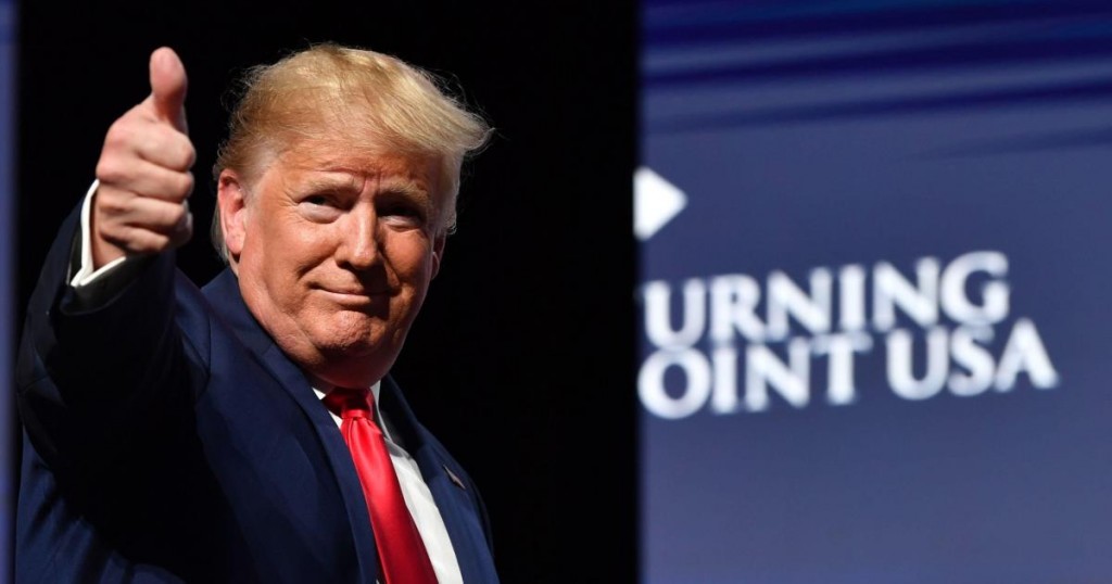 TOPSHOT - US President Donald Trump gestures during the Turning Point USA Student Action Summit at the Palm Beach County Convention Center in West Palm Beach