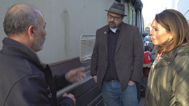 graham-pruss-salinas-speaking-to-homeless-person-living-in-rv-in-ballard-seattle.jpg 