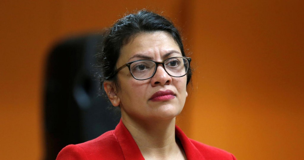 U.S. Congresswoman Rashida Tlaib listens to a comment from a constituent during a Town Hall style meeting in Inkster