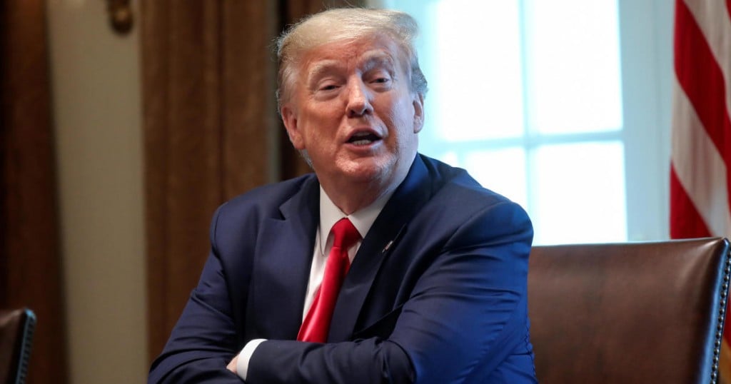 U.S. President Donald Trump speaks during a meeting with recovered coronavirus disease (COVID-19) patients and family members in the Cabinet Room at the White House in Washington