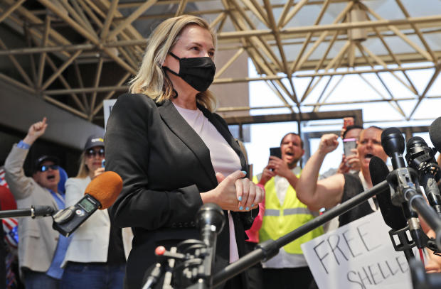 Salon owner Shelley Luther begins to speak to the media after she was released from jail in Dallas