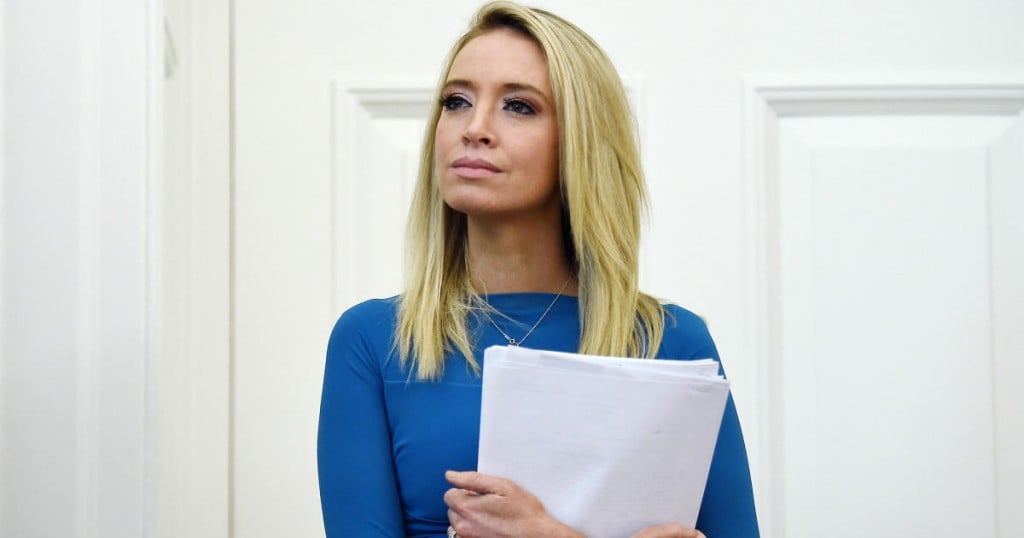 New White House Press Secretary Kayleigh McEnany looks on during a signing ceremony for the Paycheck Protection Program and Health Care Enhancement Act in the Oval Office of the White House in Washington