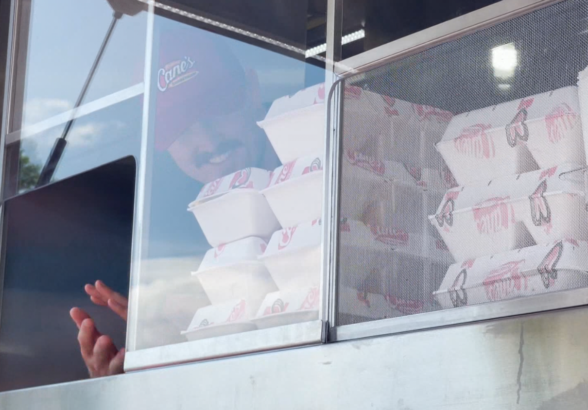 Ole Miss fans are served up a champion combo -Raisin Canes and a meet and greet with the champs - Vimarsana News