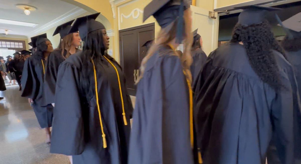 Msuw MUW students crossed the stage going from student to graduate