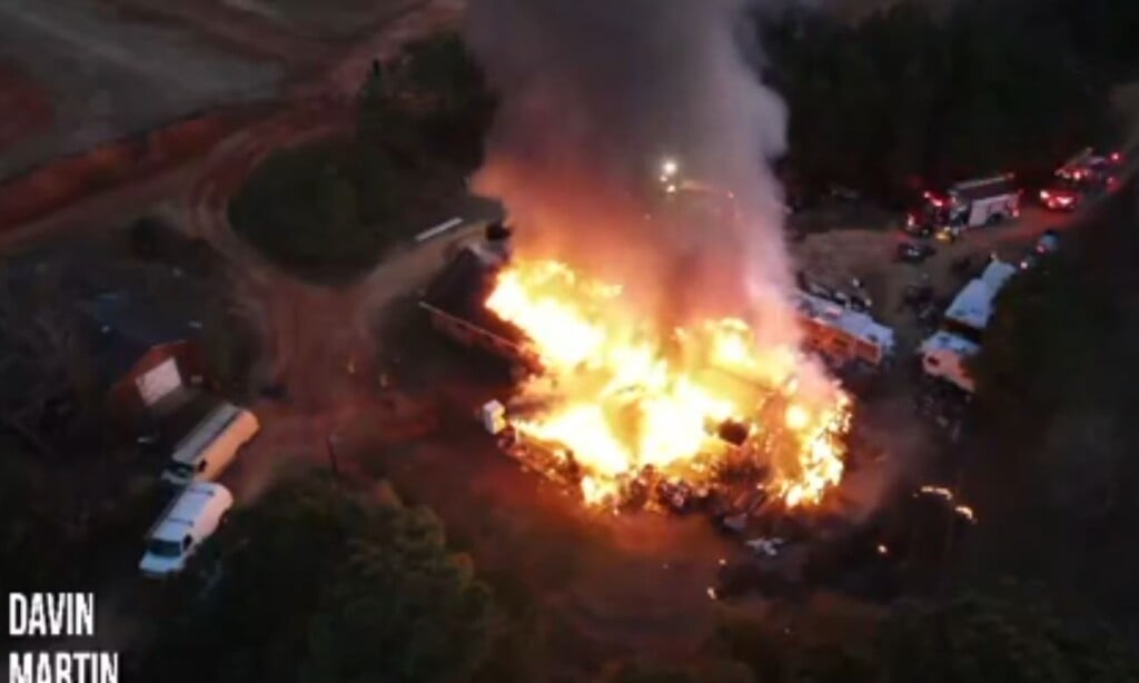 Drone footage shows volunteer firefighters battling massive blaze