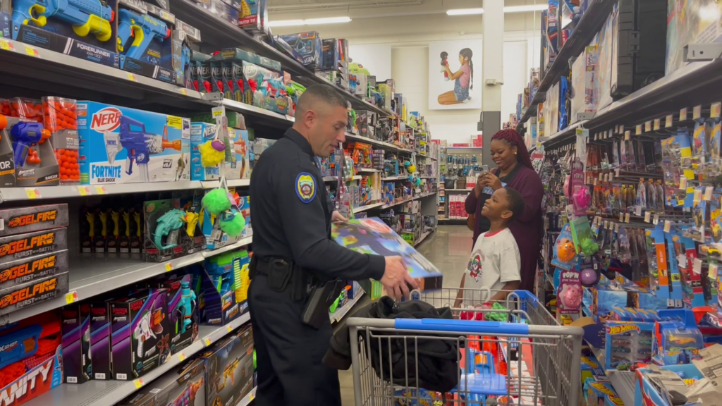 Tupelo's Shop with a Cop: Kids check items off Christmas wish lists