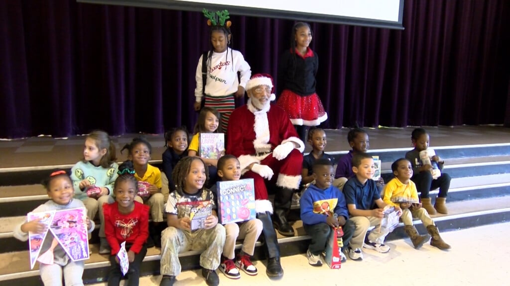 Former Fairview Elementary students host toy giveaway