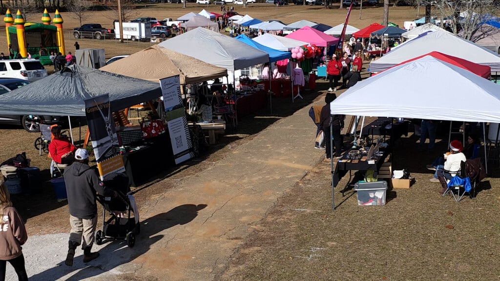 Walkway With Vendors Lining It From Above