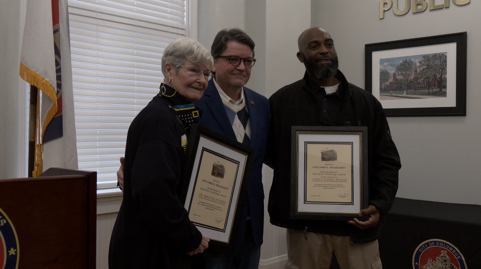 Mayor Keith Gaskin honors two resident for their work in Columbus