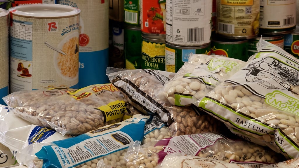 Closeup Of Dry Beans And Cans