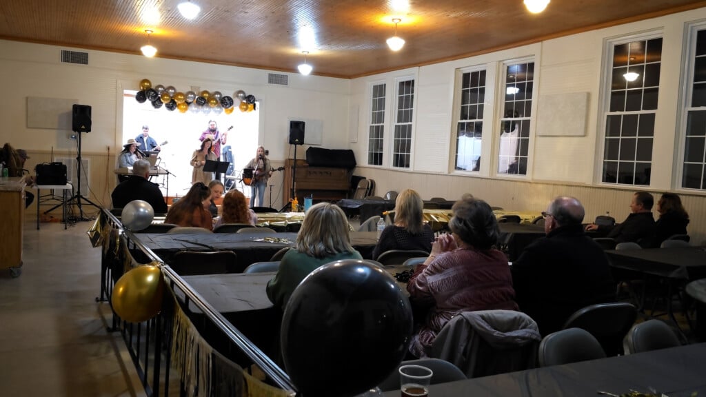 Event Hall With Band And People Watching