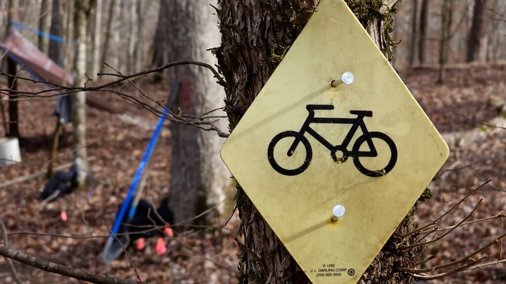 Bike Sign With Tools In Background