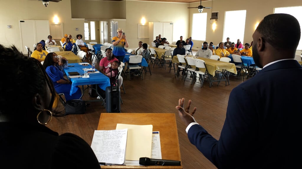 People Speaking To A Room