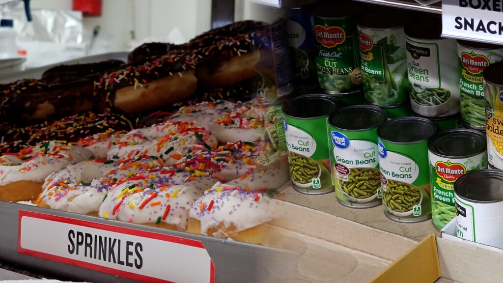 Donuts And Canned Food Side By Side