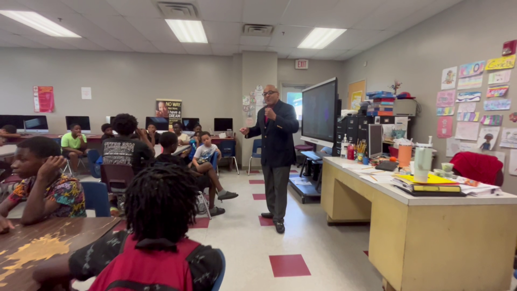 Local businessmen help lead Passport to Manhood course