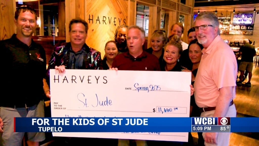 WCBI's Allie Martin accepts check on behalf of North MS St. Jude Heroes