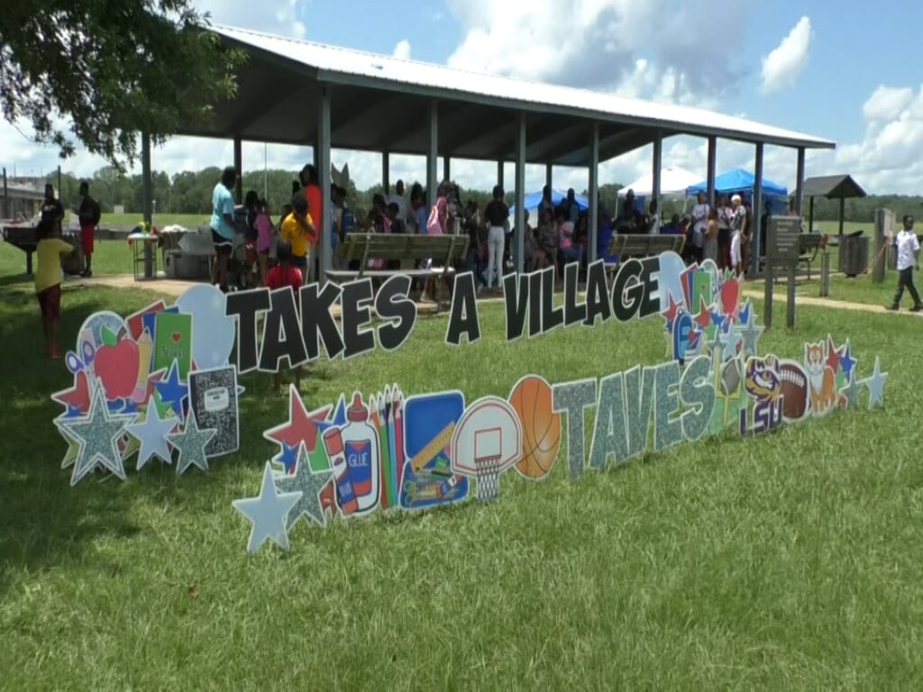 Takes A Village Sign