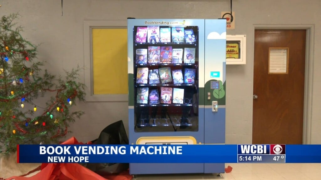 Local Companies Team Up To Bring Book Vending Machine To Elementary Students