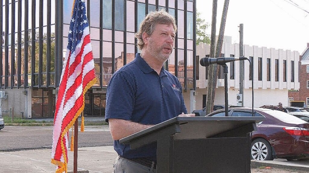 Elected officials and Co. workers come together for "Hands around the Courthouse"