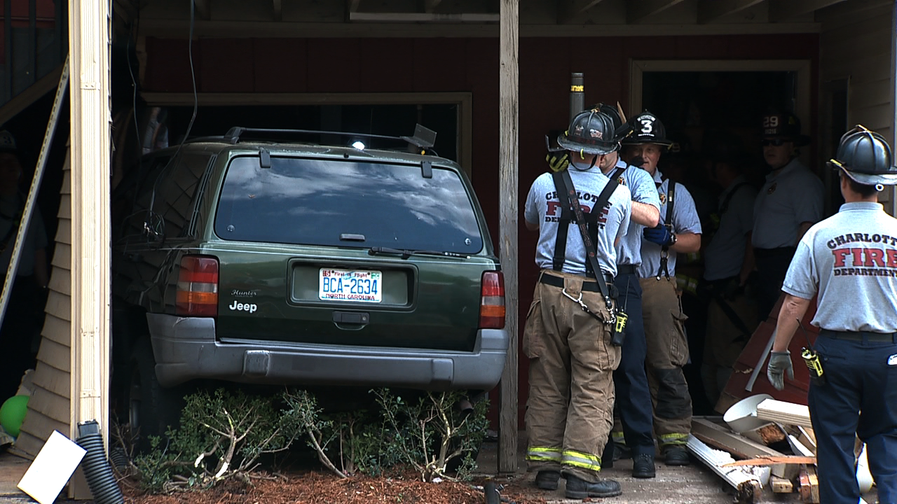Woman Slams SUV Into Apartment Building - WCCB Charlotte