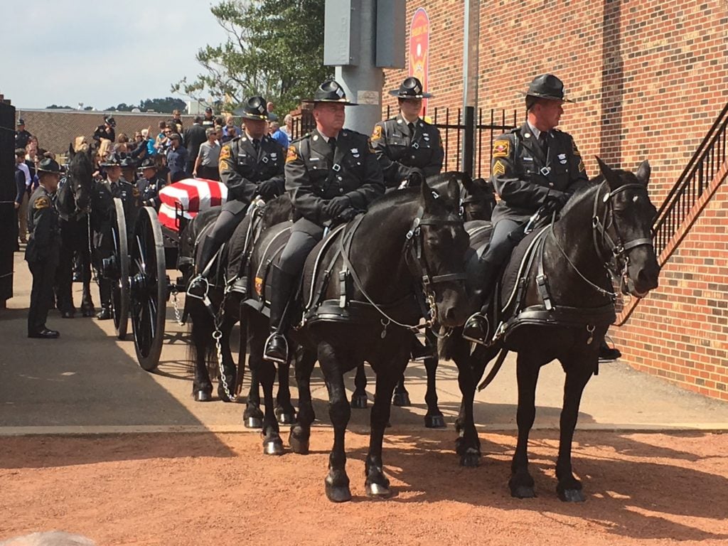 Funeral for fallen Shelby officer Time Brackeen. Photo by WCCB's Amy Cowman.
