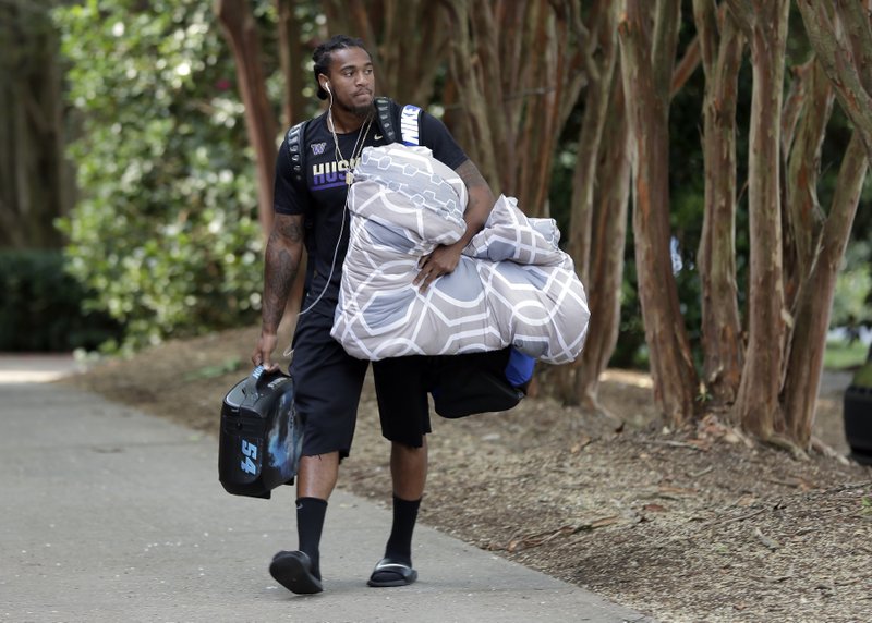 PHOTOS: Carolina Panthers arrive at Wofford College in Spartanburg