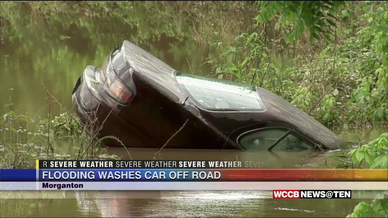Car Washed Off Road As Heavy Rains, Flooding Cause Major Problems For