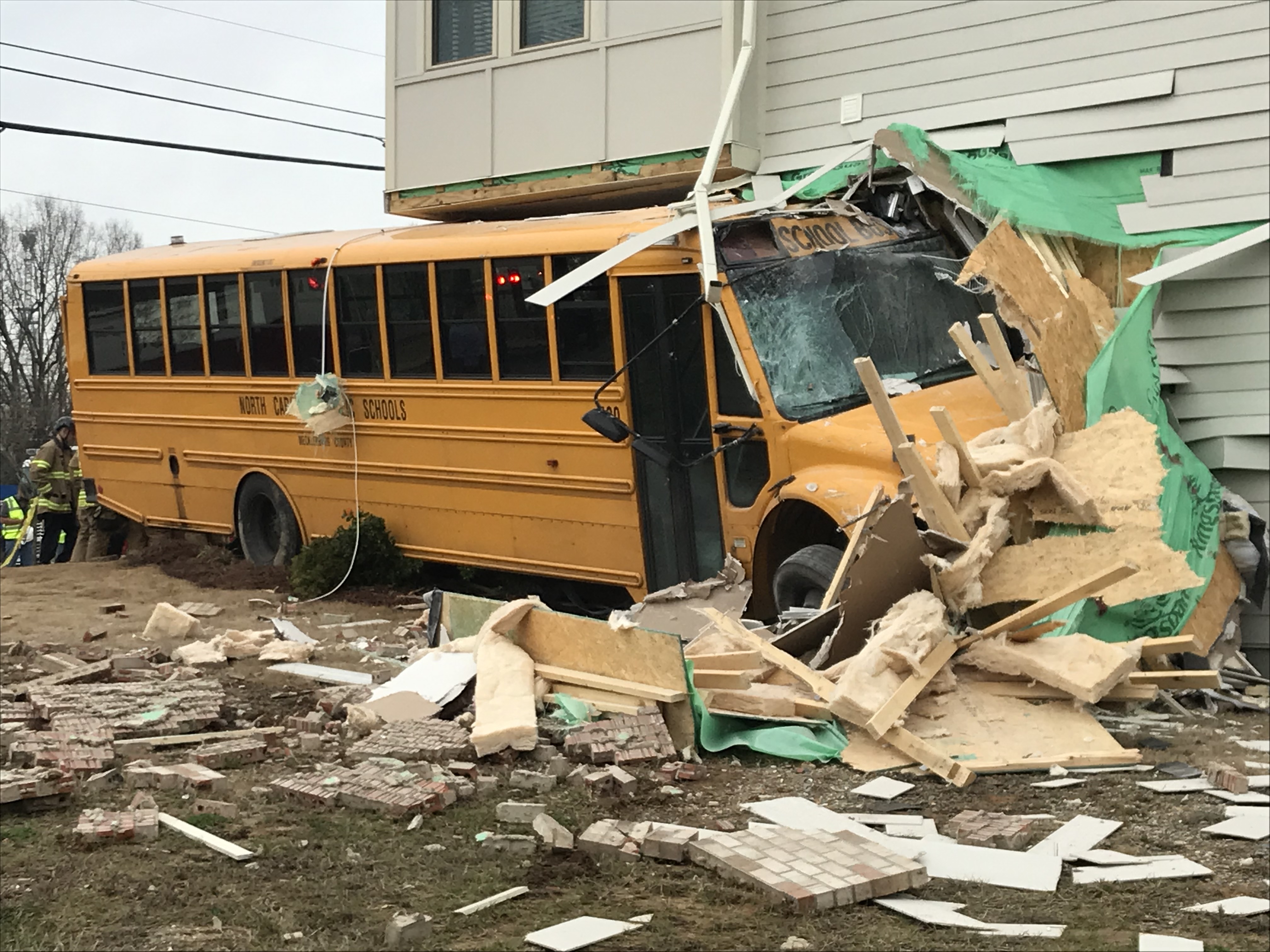 School Bus Driver Cited After Crashing Into North Charlotte Apartment ...