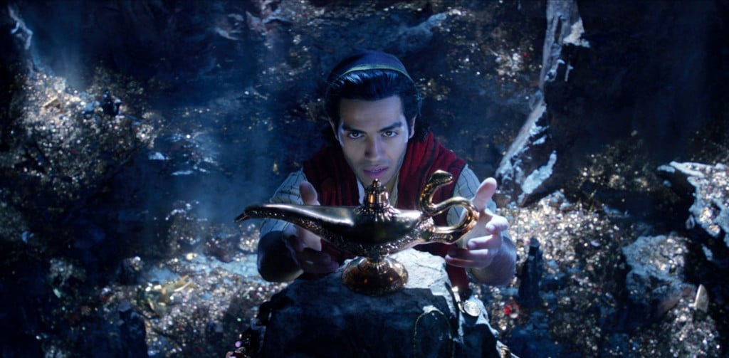 This image released by Disney shows Mena Massoud as Aladdin in Disney's live-action adaptation of the 1992 animated classic "Aladdin."