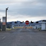 signs warn about trespassing at an entrance to the Nevada Test and Training Range near Area 51 outside of Rachel, Nev.
