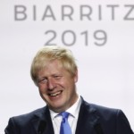 Britain's Prime Minister Boris Johnson smiles