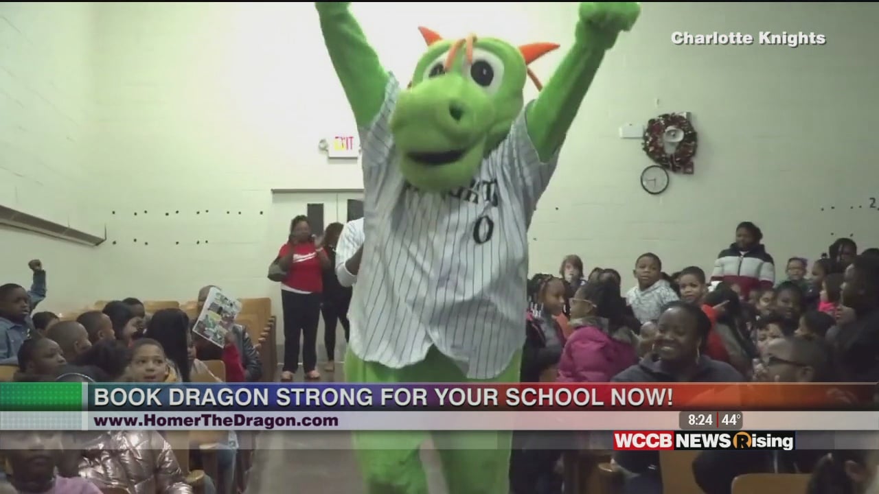 Charlotte Knights dragon mascot homer puts out fire