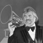 1980 File Photo, Kenny Rogers Holds A Grammy Award He Received During Presentation In Los Angles
