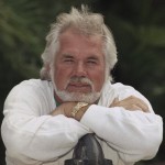 1989 File Photo Shows Kenny Rogers Posing For A Portrait In Los Angeles