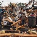 A Group Of People Help Clear Debris And Salvage Items From Pawn Depot After A Tornado Touched Down Saturday, March 28, 2020