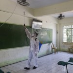 A Worker Disinfects A Classroom At A School That Has Suspended Classes As A Precautionary Measure Against The New Coronavirus In San Juan City In Manila, Philippines