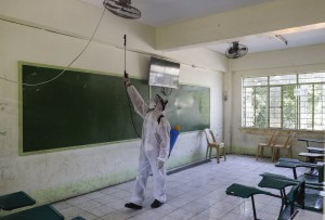 A Worker Disinfects A Classroom At A School That Has Suspended Classes As A Precautionary Measure Against The New Coronavirus In San Juan City In Manila, Philippines