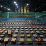 Indian Workers Arrange Beds To Prepare A Quarantine Center At The Sarusojai Sports Complex In Gauhati, India, Saturday, March 28, 2020