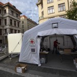 A Red Cross Tent For Registration Of Volunteers, That Help To Fight The Spread Of Coronavirus