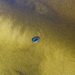 A Lonely Man Relaxes In A Rubber Boat In The Middle Of The Dnipro River Escaping From Coronavirus Human Contacts In Kyiv, Ukraine, April 6, 2020