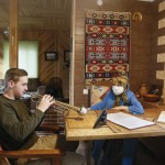 A Student Practices Trumpet During An Online Lesson To Get Ready For His Final Exam In A Music School